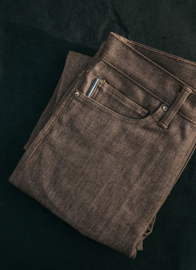 The Pen Slim 10.5 oz Brown Raw Denim